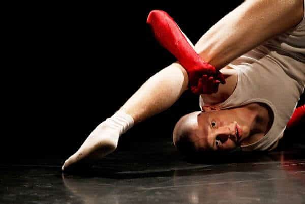 Palucca student performing on a black Harlequin Standfast stage floor