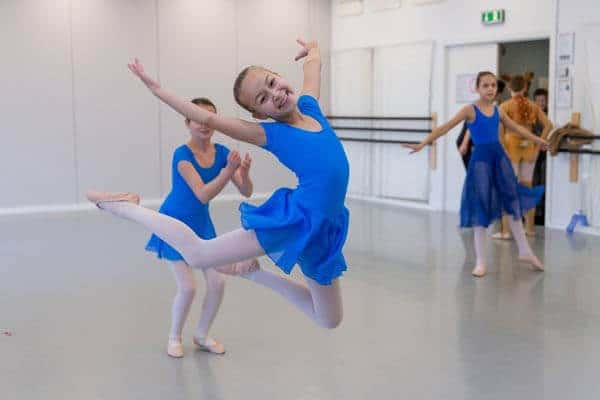 Jumping, smiling ballerina at Ballettskolen Holstebro
