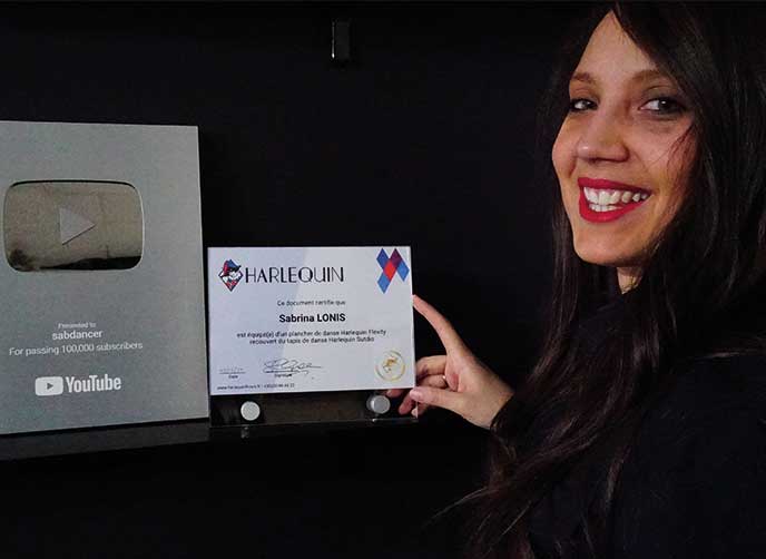 Sabrina Lonis with her Youtube and Harlequin plaques LoRes