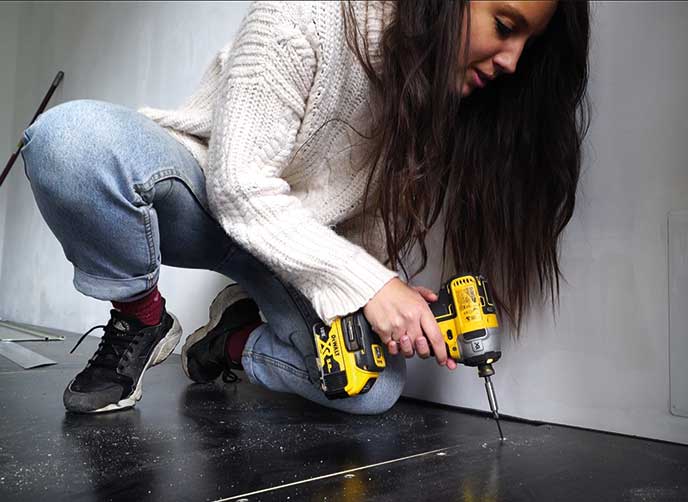 Sabrina installing the Harlequin Flexity floor LoRes 1