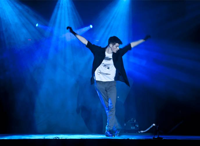 Tap dancer performing a solo on Harlequin Cascade vinyl flooring