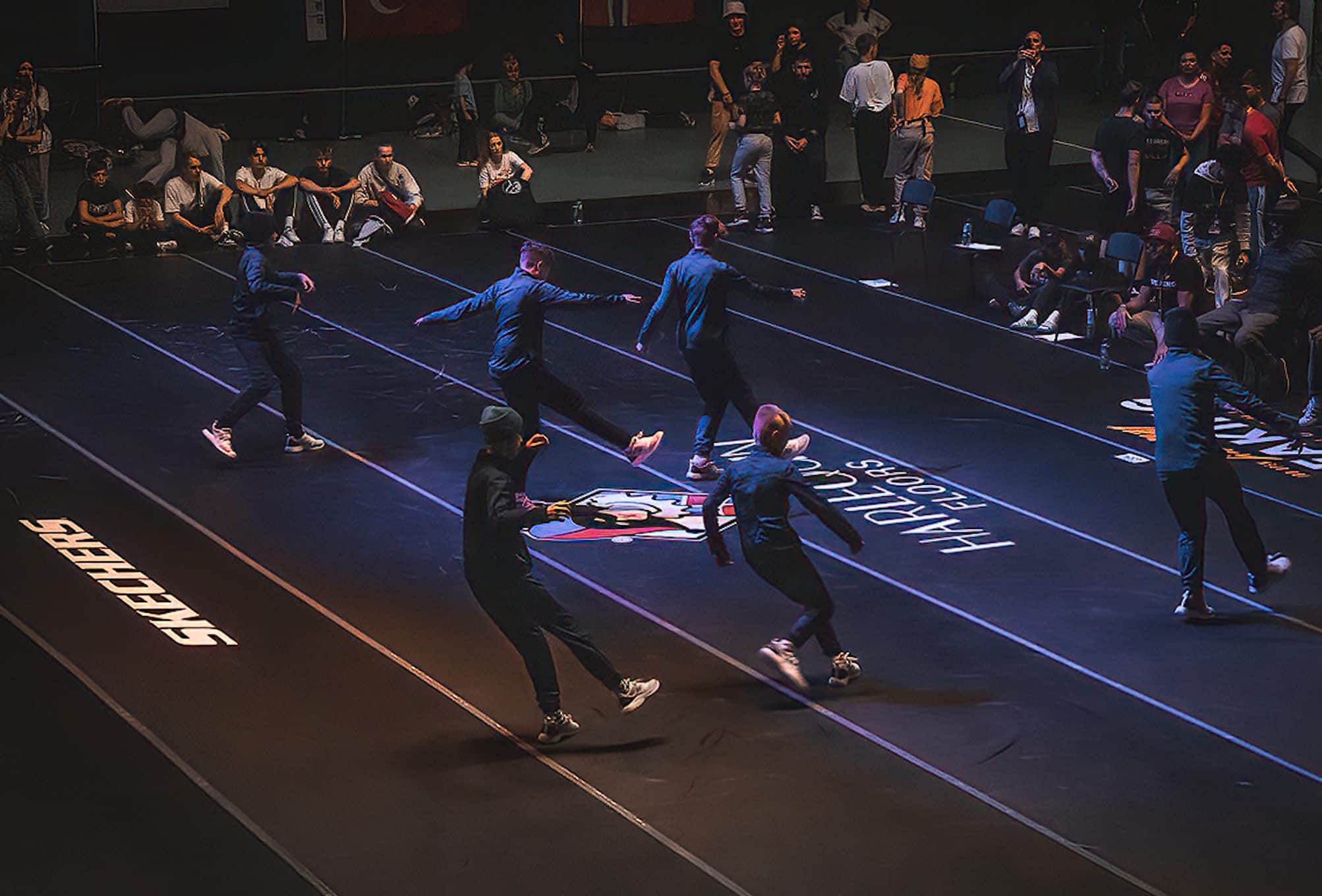 EBC 2022 dancing on Harlequin logo